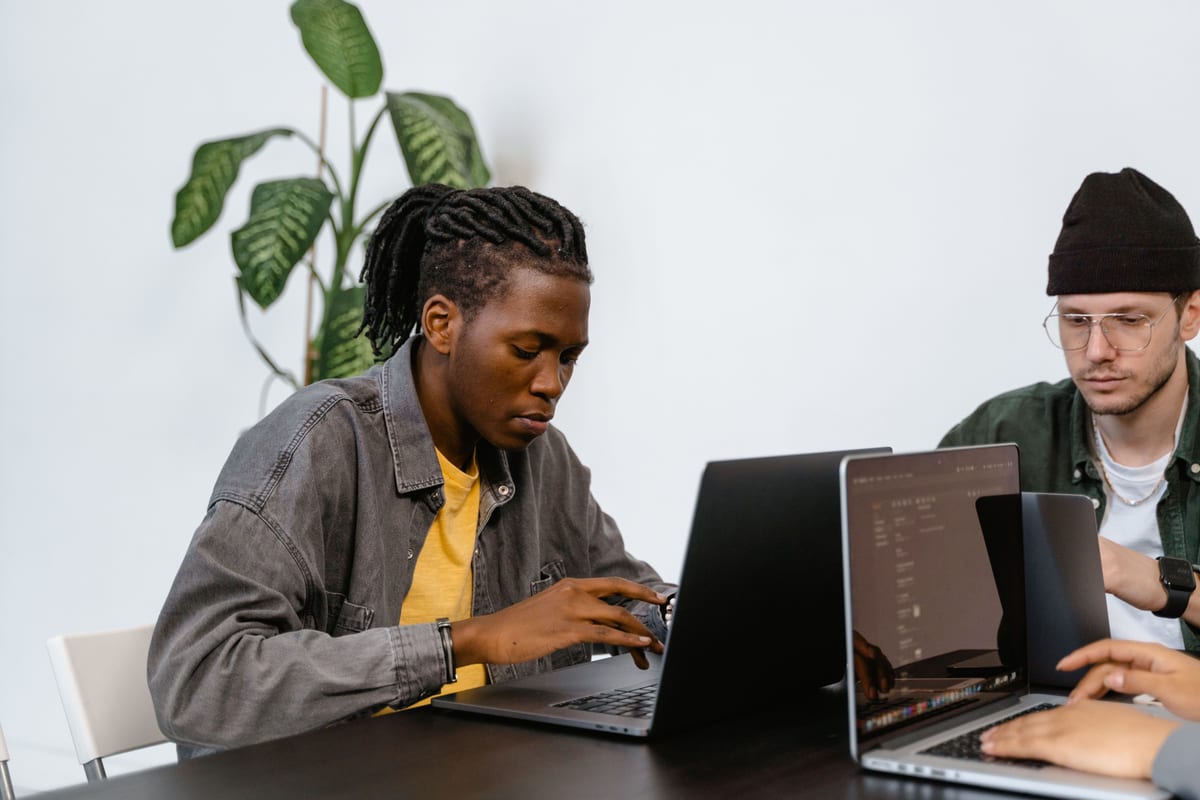 A merchant working on his laptop
